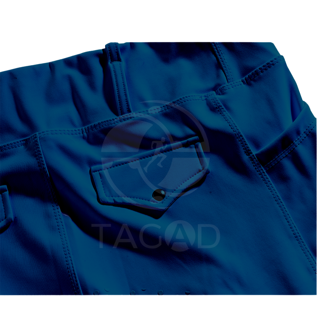 Close-up of waist area showing detailed stitching and fabric texture on equestrian pants designed for comfort and durability